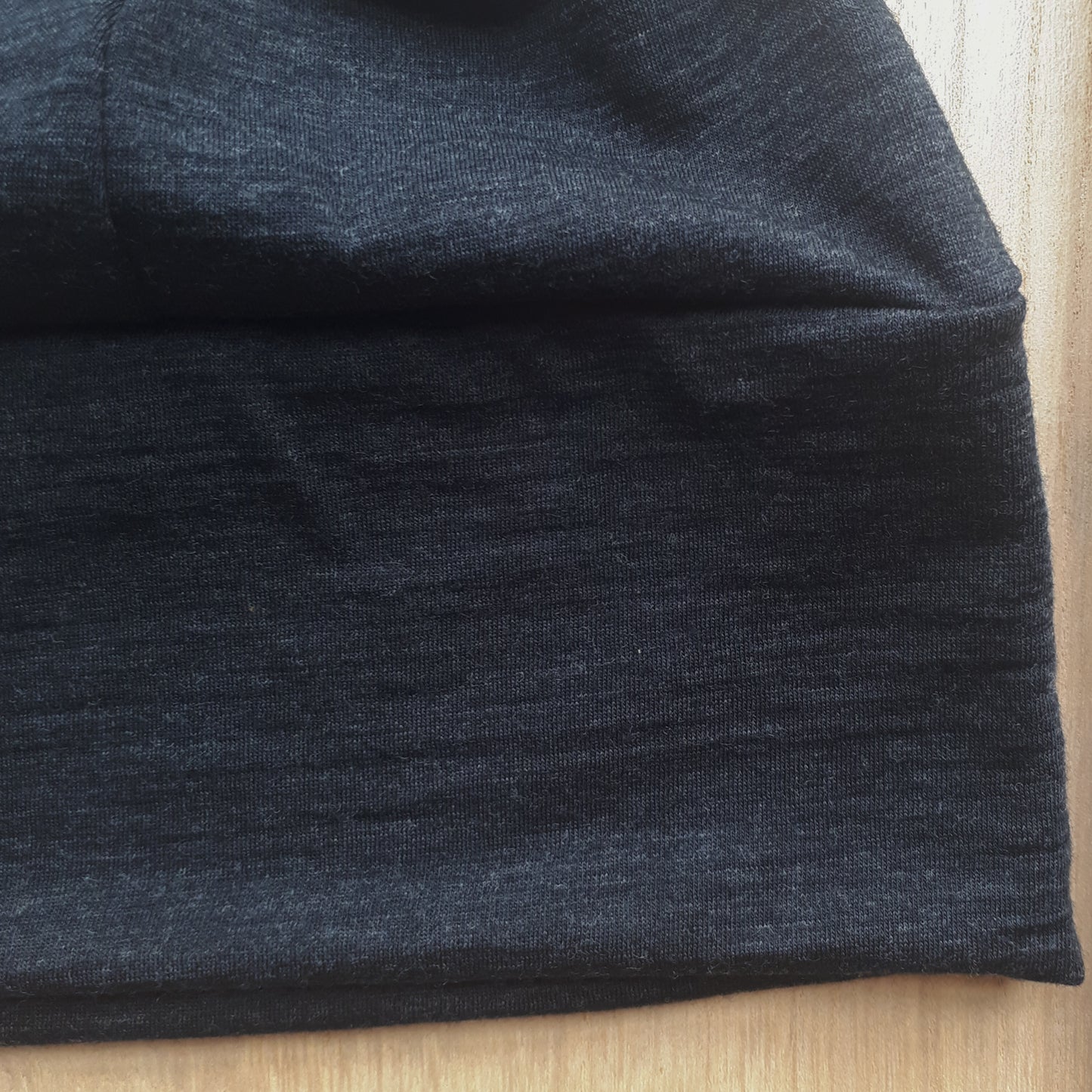 Close up of charcoal merino fabric